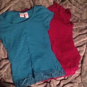 2 cute shirts with lace on the bottoms